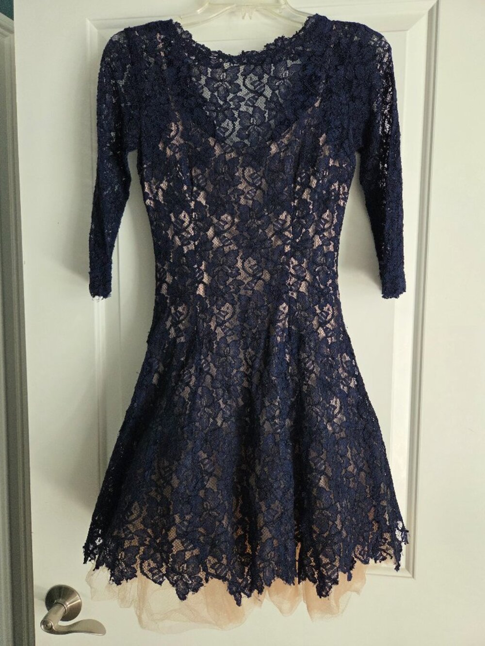 Women's navy blue dress with large skirt, 3/4 length sleeves. Size 0